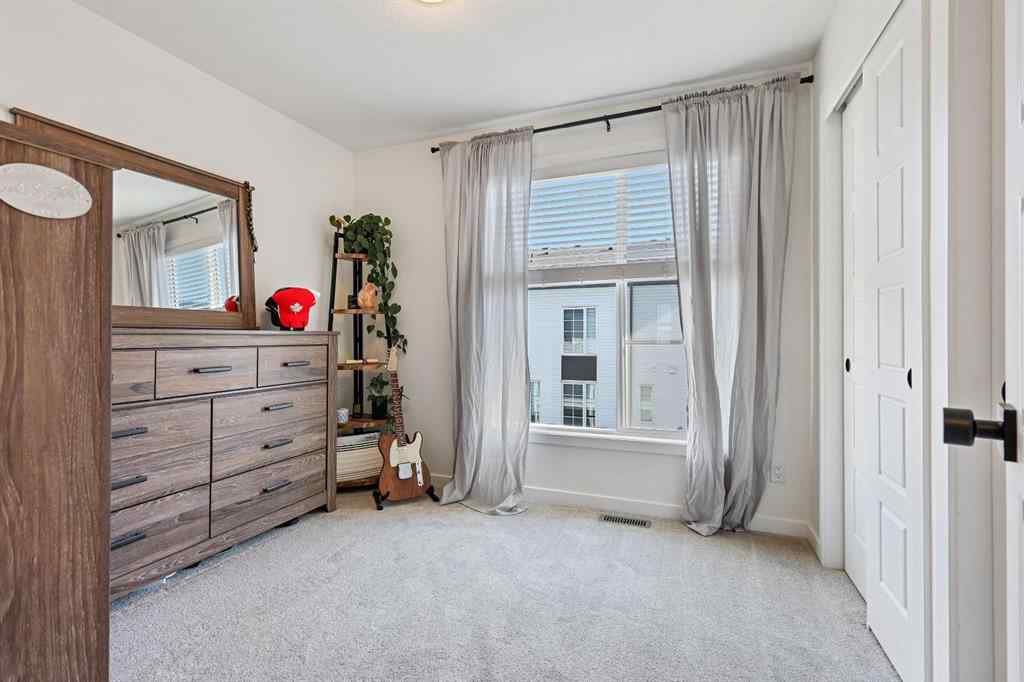 MLS® A2264157 - 918 Walgrove Boulevard SE in Walden Calgary, Residential