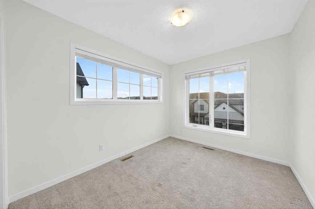 MLS® A2264158 - 675 South Point Heath SW in South Point Airdrie, Residential