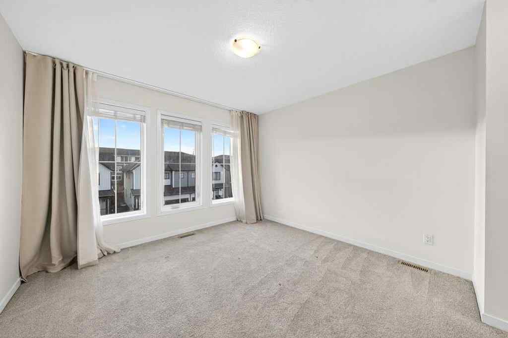 MLS® A2264158 - 675 South Point Heath SW in South Point Airdrie, Residential