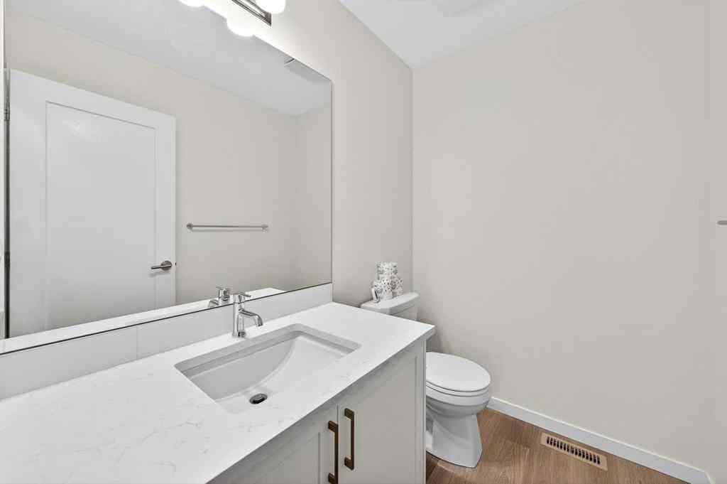 MLS® A2264158 - 675 South Point Heath SW in South Point Airdrie, Residential