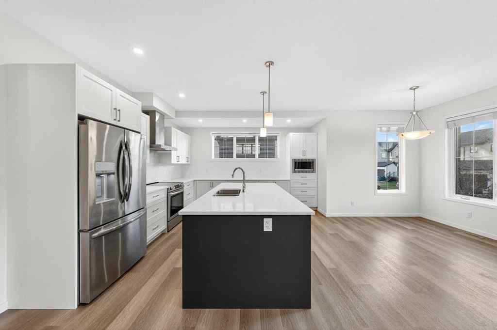 MLS® A2264158 - 675 South Point Heath SW in South Point Airdrie, Residential