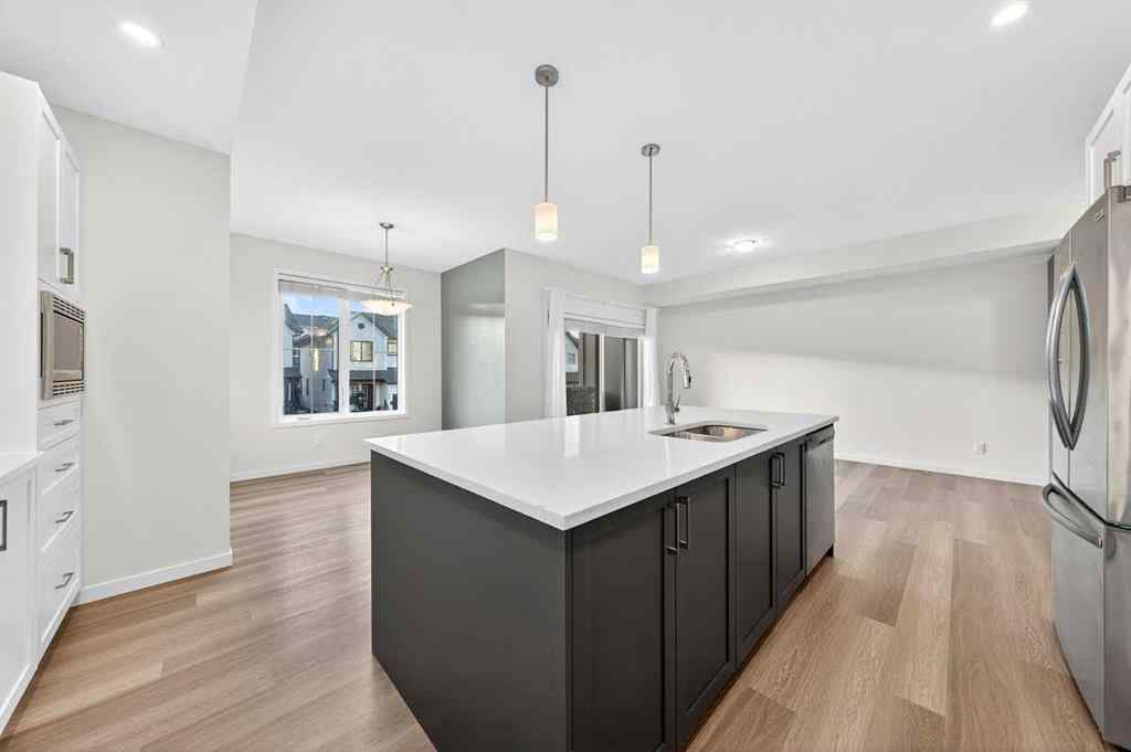 MLS® A2264158 - 675 South Point Heath SW in South Point Airdrie, Residential