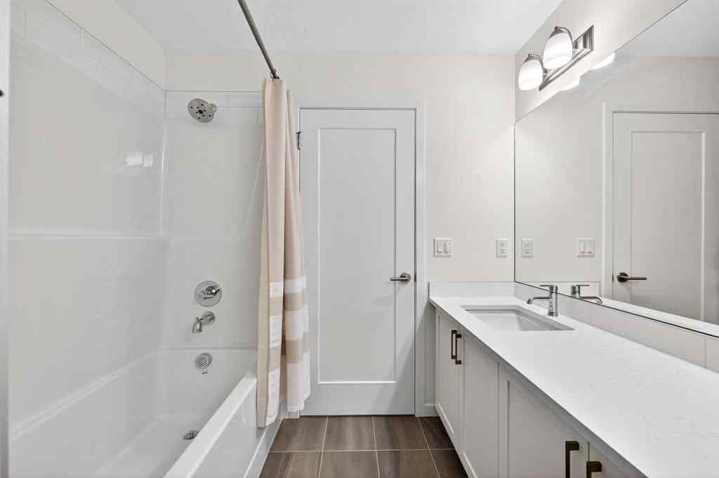 MLS® A2264158 - 675 South Point Heath SW in South Point Airdrie, Residential