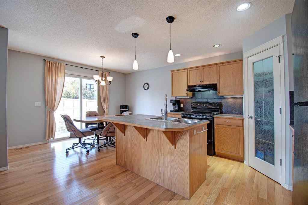 MLS® A2264160 - 209 Sagewood Place SW in Sagewood Airdrie, Residential