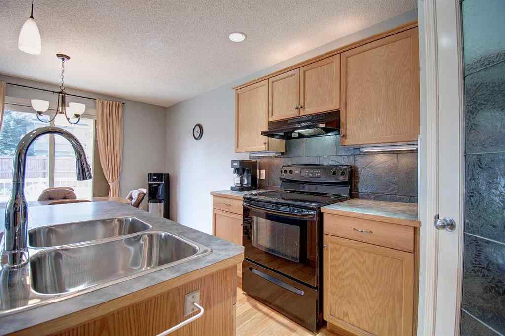 MLS® A2264160 - 209 Sagewood Place SW in Sagewood Airdrie, Residential