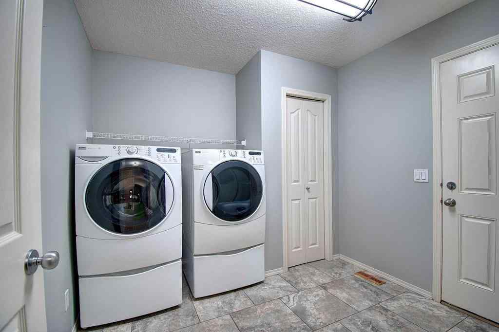MLS® A2264160 - 209 Sagewood Place SW in Sagewood Airdrie, Residential