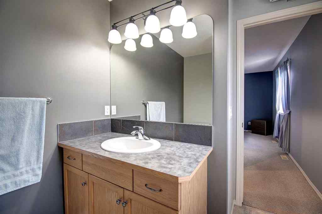 MLS® A2264160 - 209 Sagewood Place SW in Sagewood Airdrie, Residential