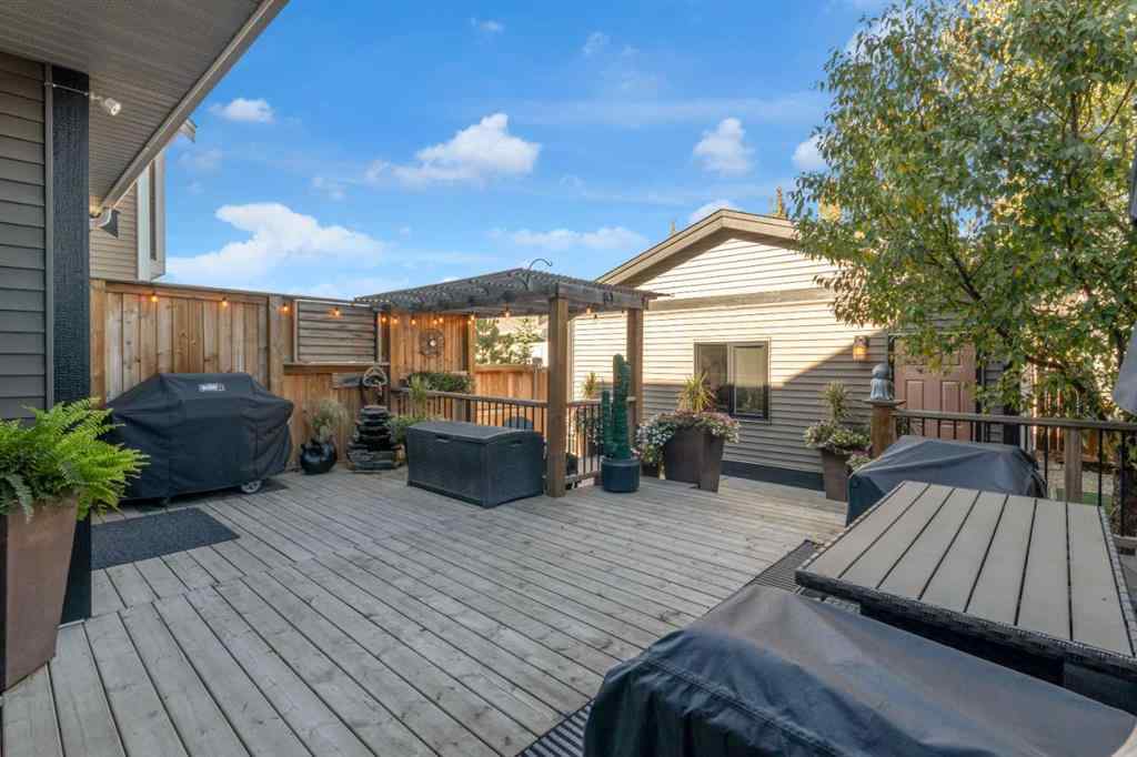 MLS® A2264161 - 1288 Coopers Drive SW in Coopers Crossing Airdrie, Residential
