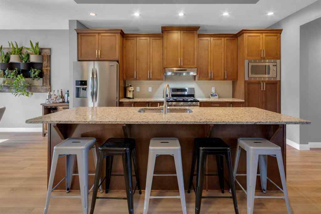 MLS® A2264161 - 1288 Coopers Drive SW in Coopers Crossing Airdrie, Residential