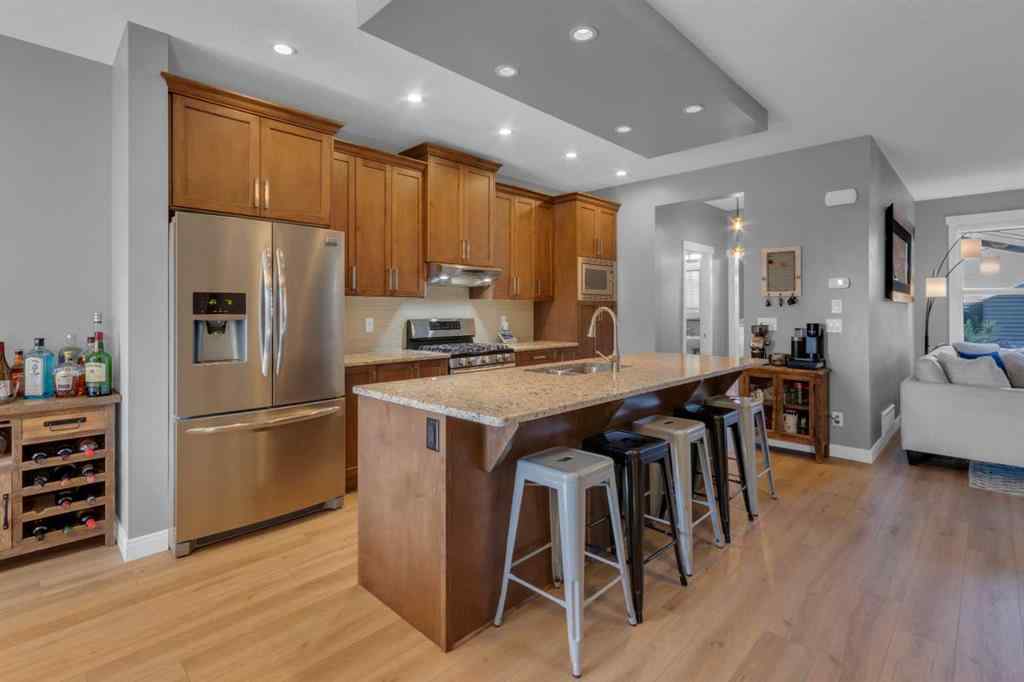 MLS® A2264161 - 1288 Coopers Drive SW in Coopers Crossing Airdrie, Residential