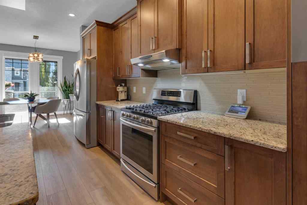 MLS® A2264161 - 1288 Coopers Drive SW in Coopers Crossing Airdrie, Residential