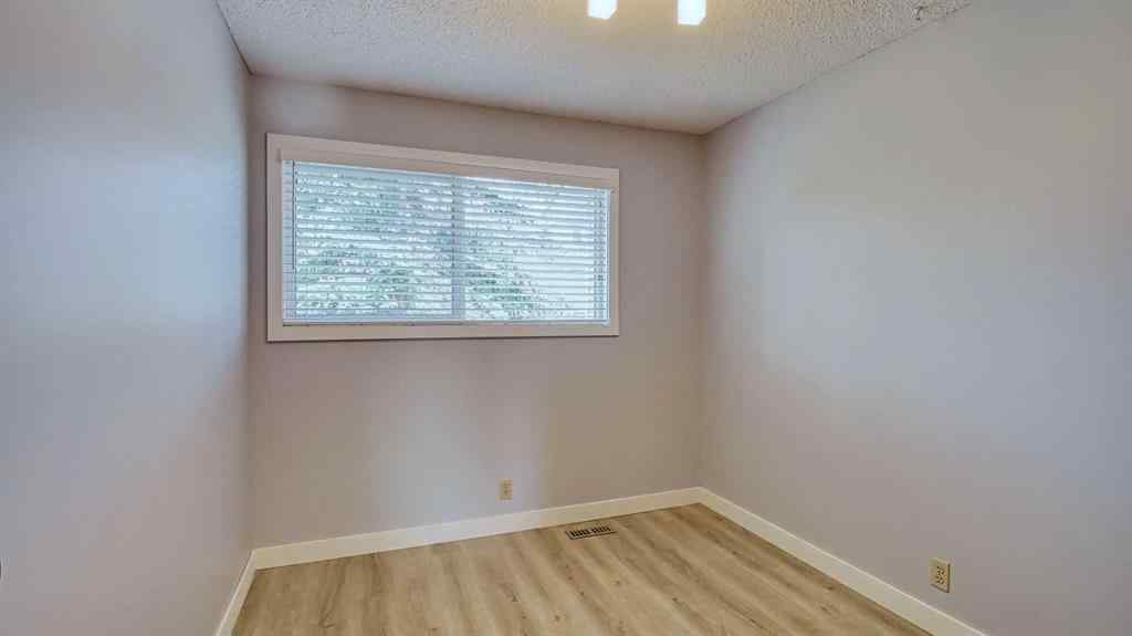 MLS® A2264163 - 123 Woodsman Lane SW in Woodbine Calgary, Residential