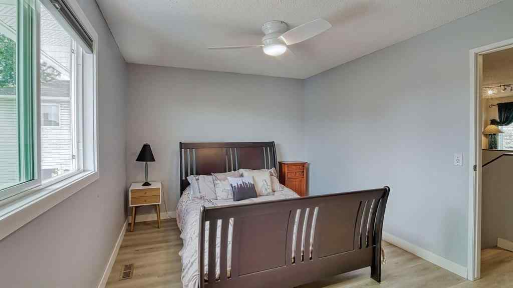 MLS® A2264163 - 123 Woodsman Lane SW in Woodbine Calgary, Residential