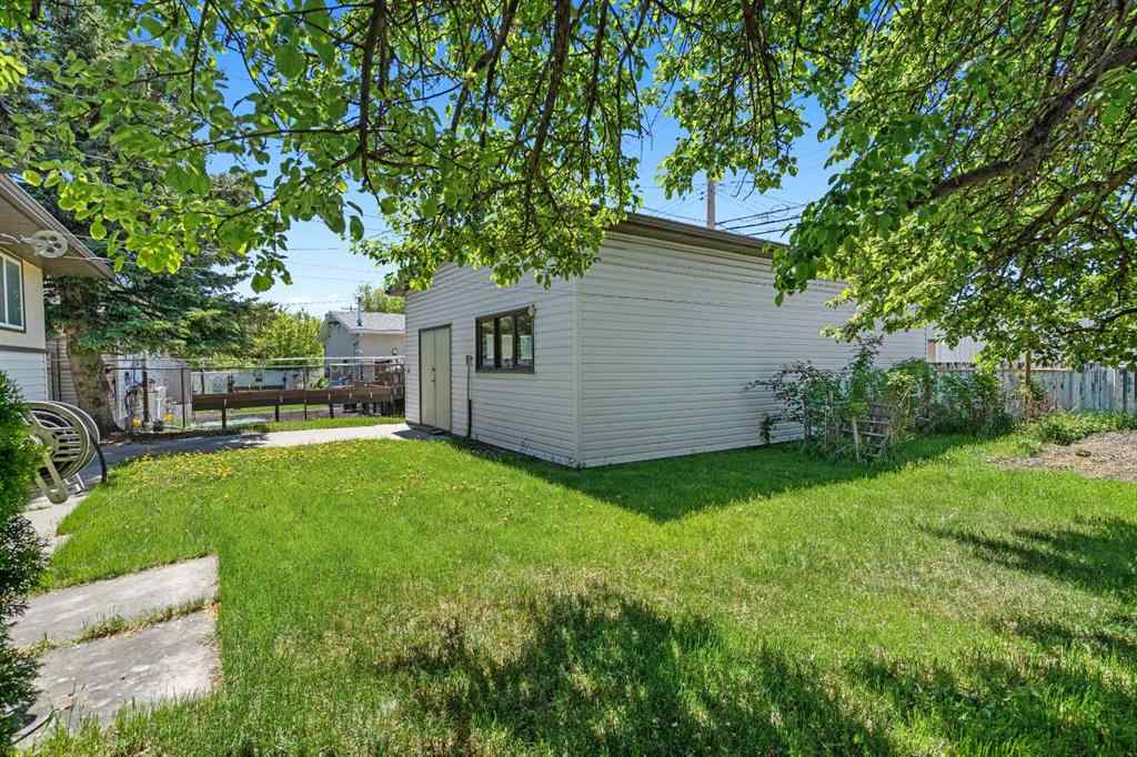 MLS® A2264182 - 703 47 Street SE in Forest Heights Calgary, Residential