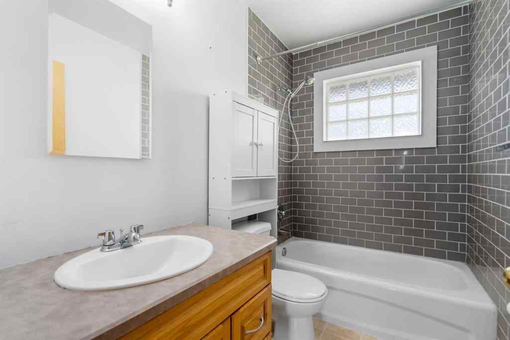 MLS® A2264182 - 703 47 Street SE in Forest Heights Calgary, Residential