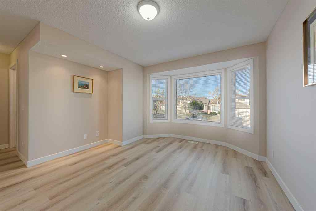 MLS® A2264188 - 19 Sandarac Road NW in Sandstone Valley Calgary, Residential
