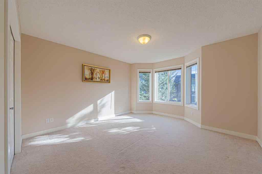 MLS® A2264188 - 19 Sandarac Road NW in Sandstone Valley Calgary, Residential