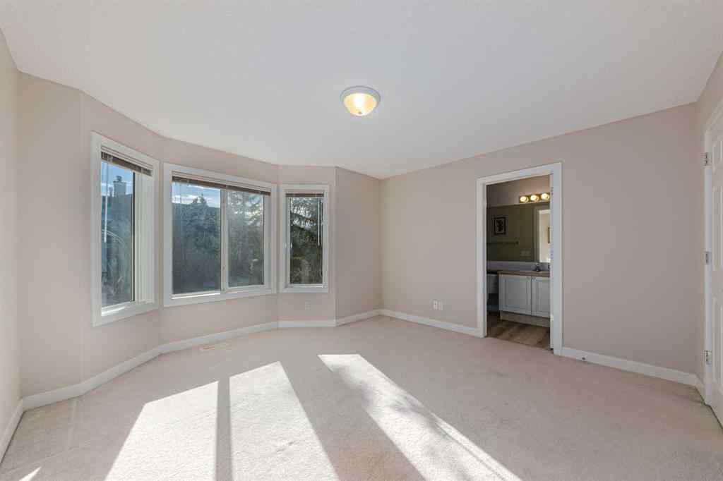 MLS® A2264188 - 19 Sandarac Road NW in Sandstone Valley Calgary, Residential