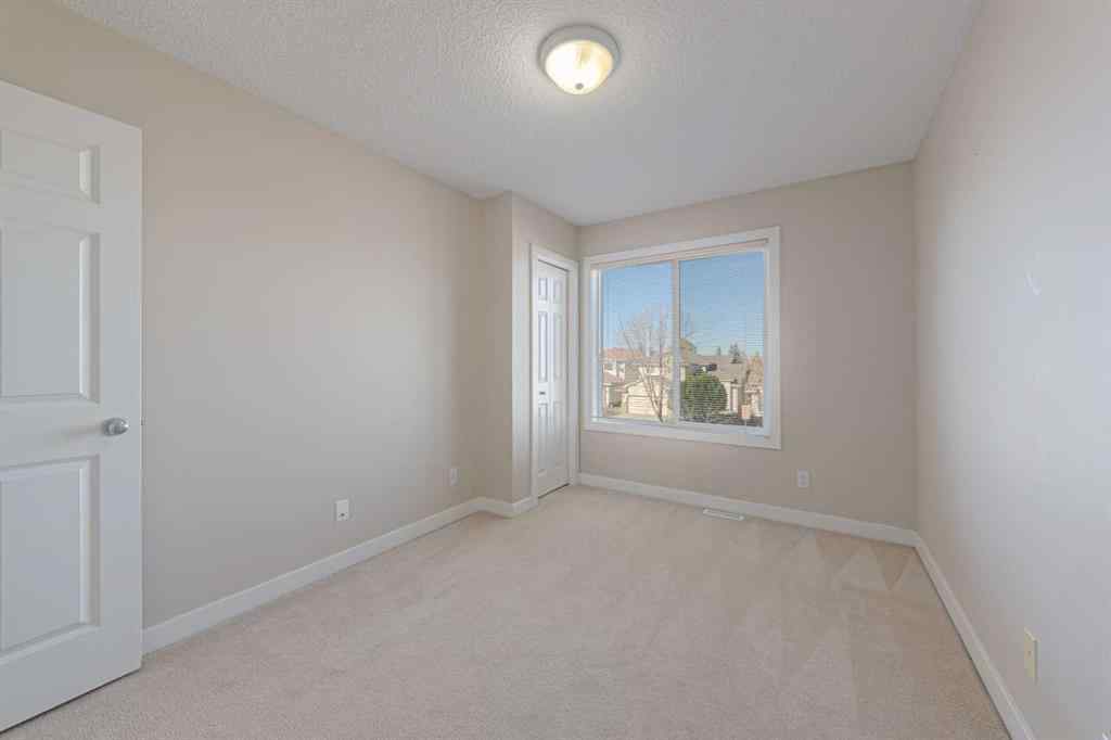 MLS® A2264188 - 19 Sandarac Road NW in Sandstone Valley Calgary, Residential
