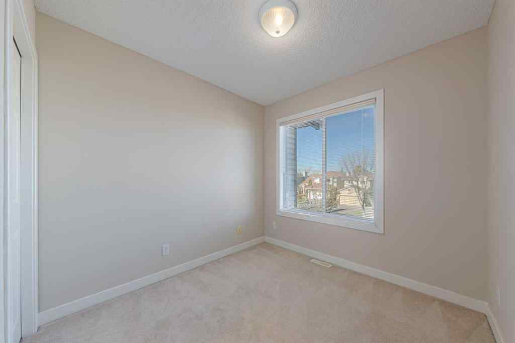 MLS® A2264188 - 19 Sandarac Road NW in Sandstone Valley Calgary, Residential