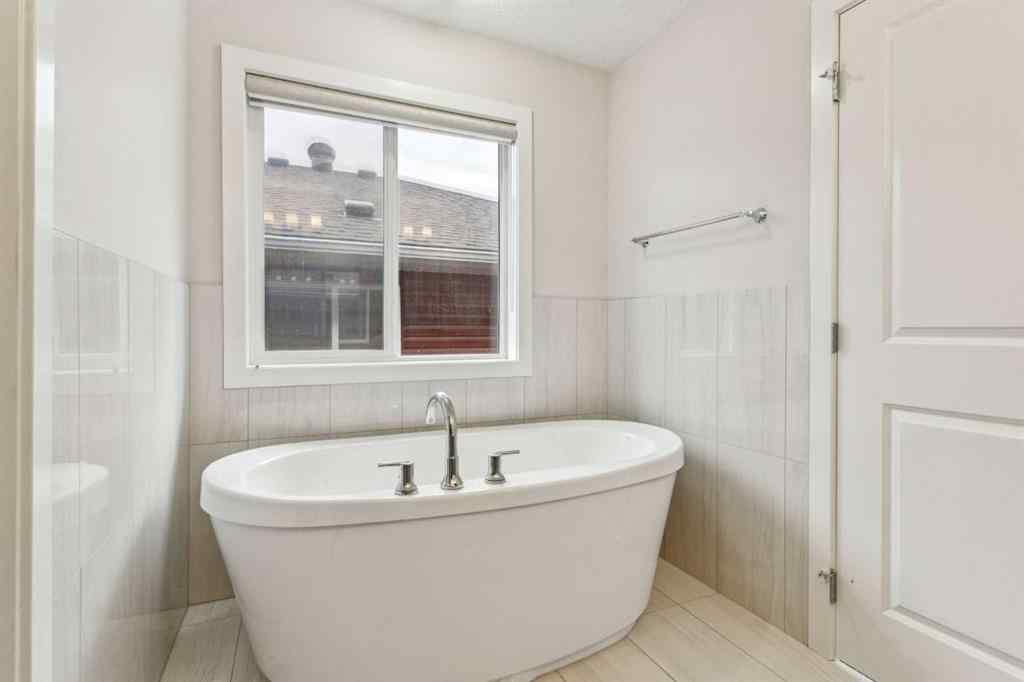 MLS® A2264197 - 118 Saddlestone Park NE in Saddle Ridge Calgary, Residential