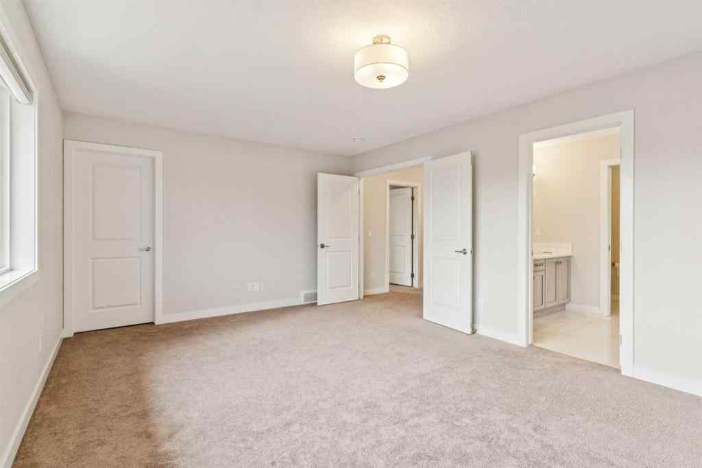 MLS® A2264197 - 118 Saddlestone Park NE in Saddle Ridge Calgary, Residential