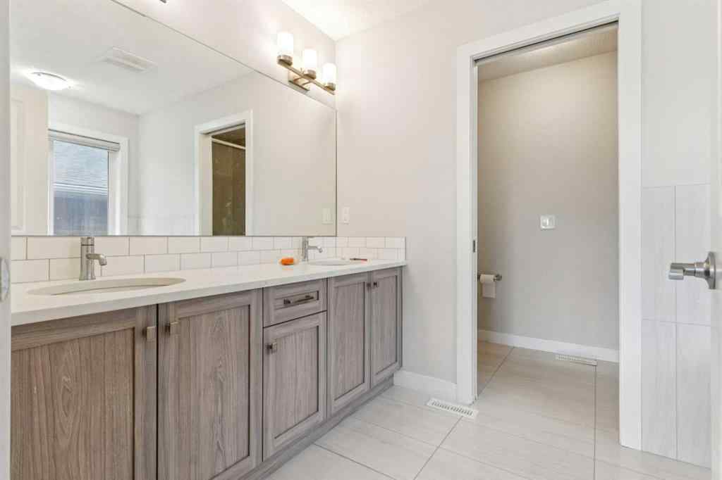 MLS® A2264197 - 118 Saddlestone Park NE in Saddle Ridge Calgary, Residential