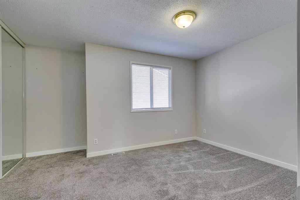 MLS® A2264210 - Unit #52 219 90 Avenue SE in Acadia Calgary, Residential