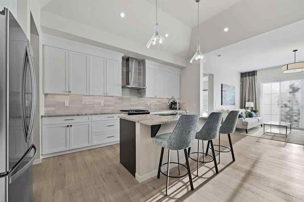 MLS® A2264216 - 12 Cranbrook Mews SE in Cranston Calgary, Residential