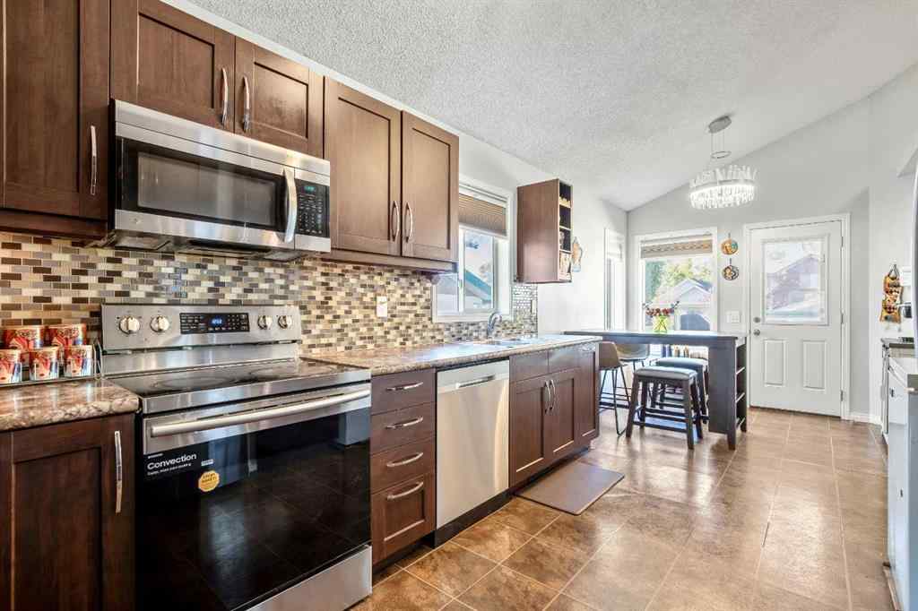 MLS® A2264218 - 273 Mt Allan Circle SE in McKenzie Lake Calgary, Residential