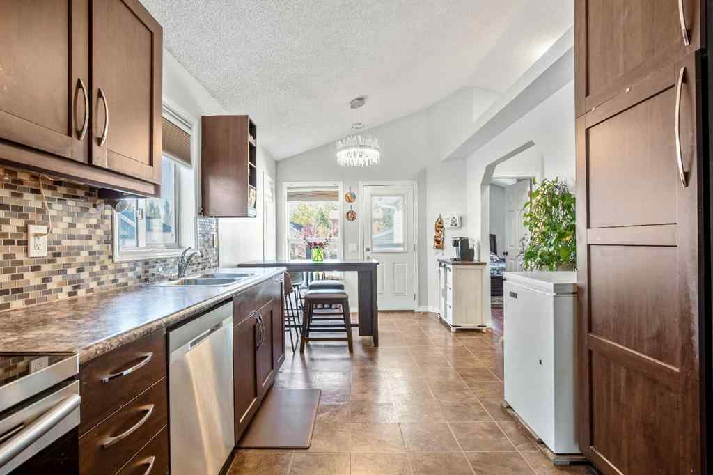 MLS® A2264218 - 273 Mt Allan Circle SE in McKenzie Lake Calgary, Residential
