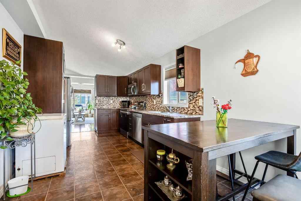 MLS® A2264218 - 273 Mt Allan Circle SE in McKenzie Lake Calgary, Residential