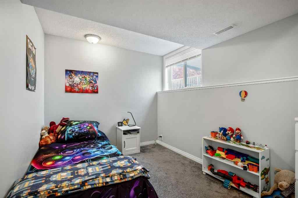 MLS® A2264218 - 273 Mt Allan Circle SE in McKenzie Lake Calgary, Residential