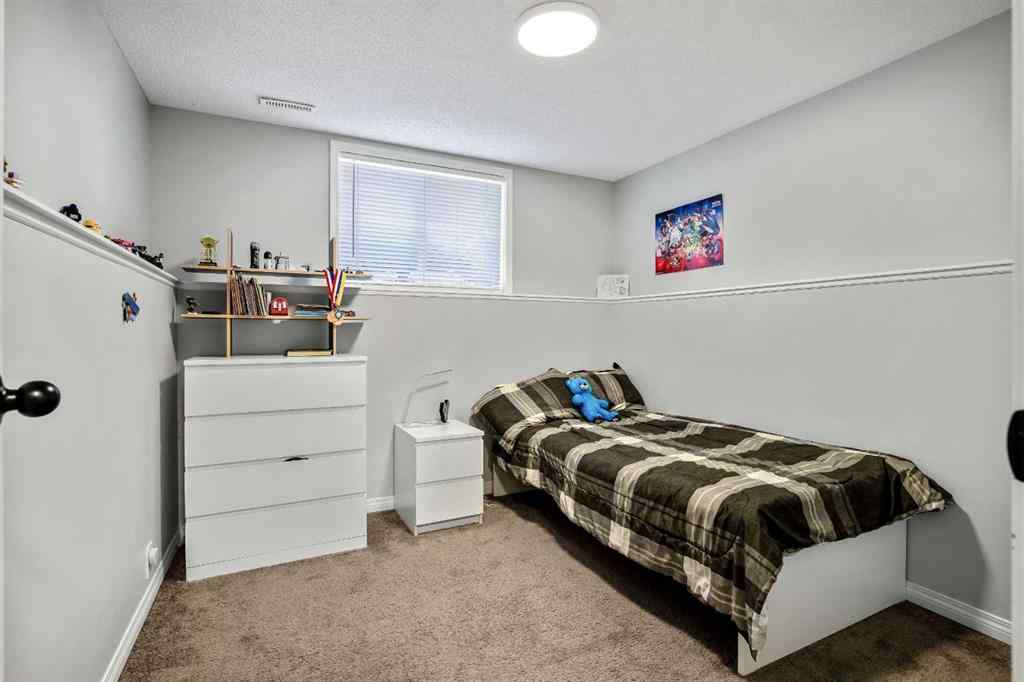 MLS® A2264218 - 273 Mt Allan Circle SE in McKenzie Lake Calgary, Residential