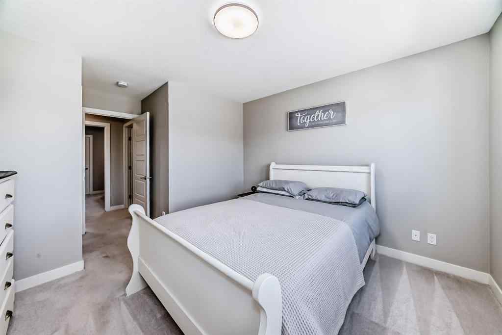 MLS® A2264261 - 386 Sundown Road  in Sunset Ridge Cochrane, Residential