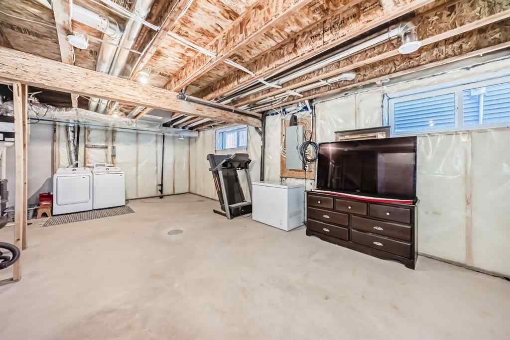 MLS® A2264261 - 386 Sundown Road  in Sunset Ridge Cochrane, Residential