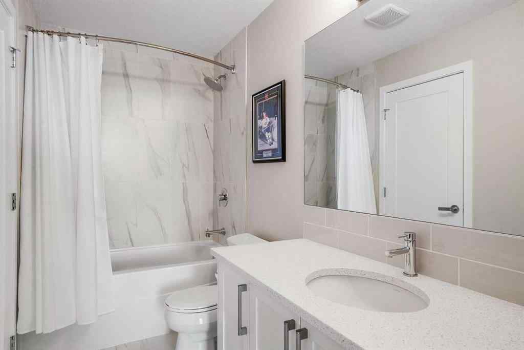 MLS® A2264265 - Unit #318 8530 8A Avenue SW in West Springs Calgary, Residential