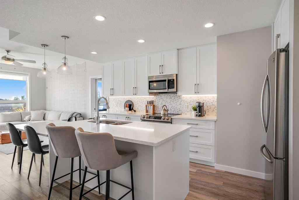 MLS® A2264265 - Unit #318 8530 8A Avenue SW in West Springs Calgary, Residential