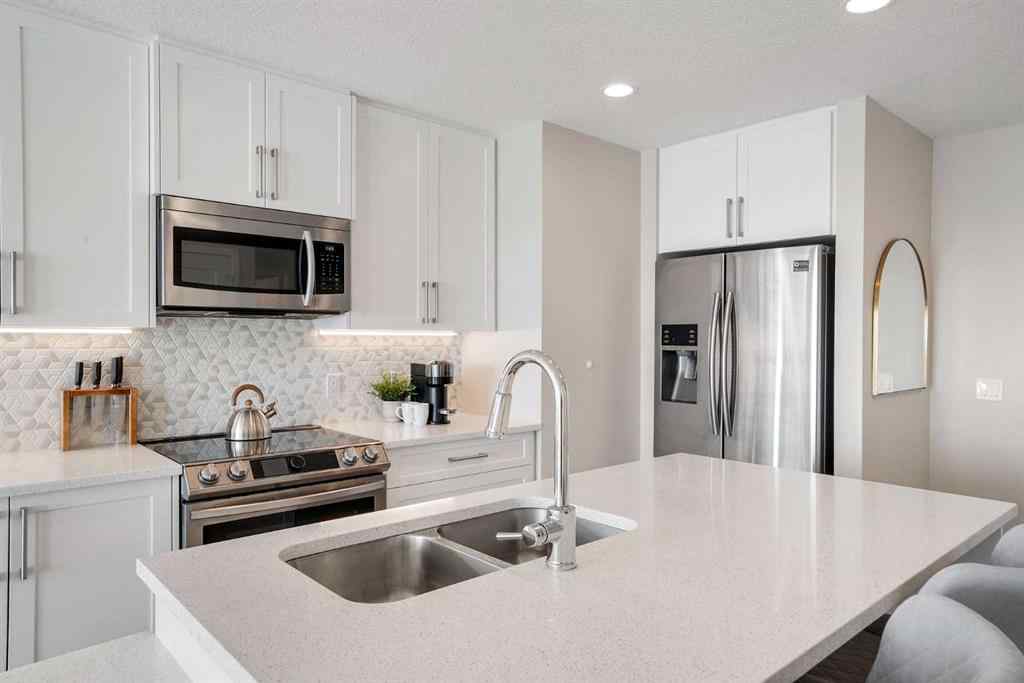 MLS® A2264265 - Unit #318 8530 8A Avenue SW in West Springs Calgary, Residential