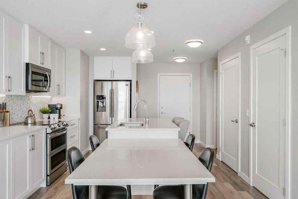 MLS® A2264265 - Unit #318 8530 8A Avenue SW in West Springs Calgary, Residential