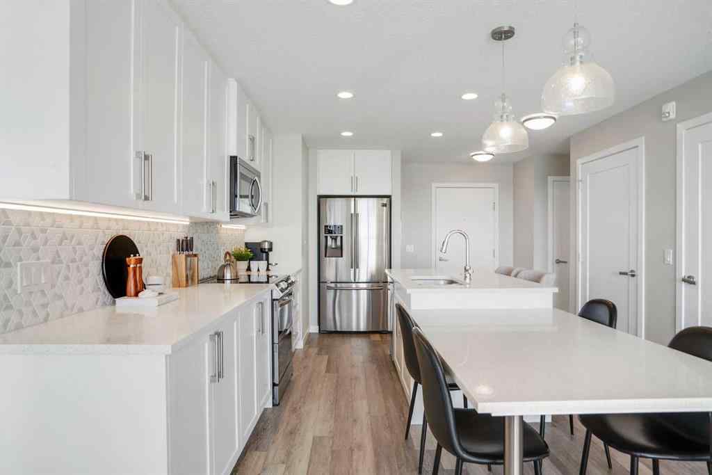 MLS® A2264265 - Unit #318 8530 8A Avenue SW in West Springs Calgary, Residential