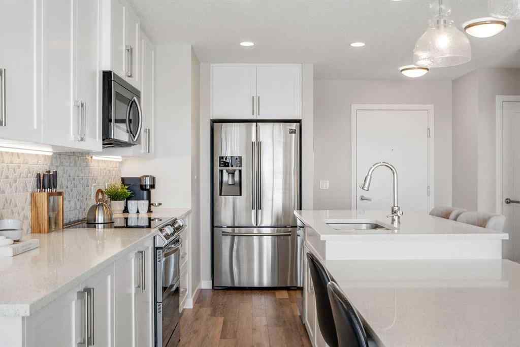 MLS® A2264265 - Unit #318 8530 8A Avenue SW in West Springs Calgary, Residential