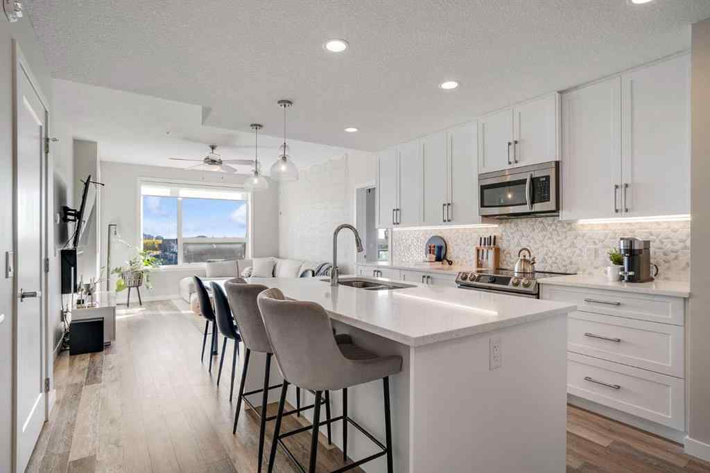 MLS® A2264265 - Unit #318 8530 8A Avenue SW in West Springs Calgary, Residential