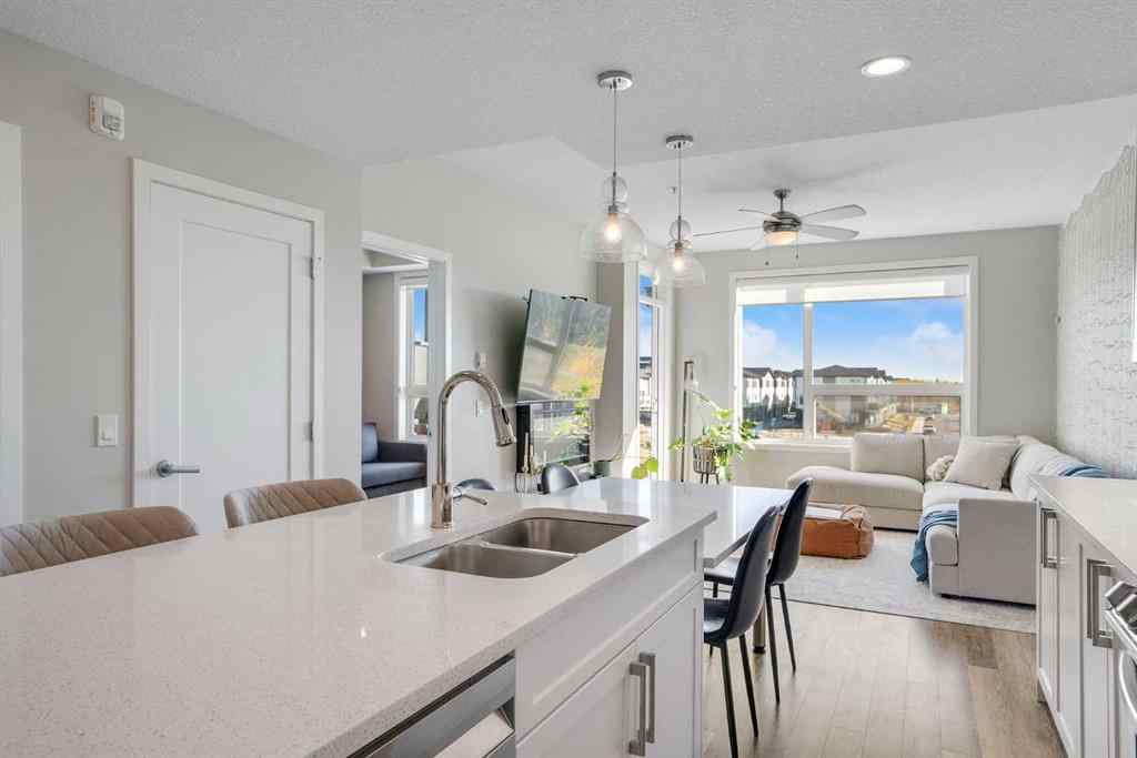 MLS® A2264265 - Unit #318 8530 8A Avenue SW in West Springs Calgary, Residential