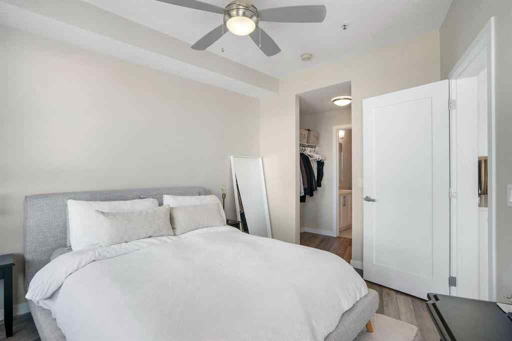 MLS® A2264265 - Unit #318 8530 8A Avenue SW in West Springs Calgary, Residential