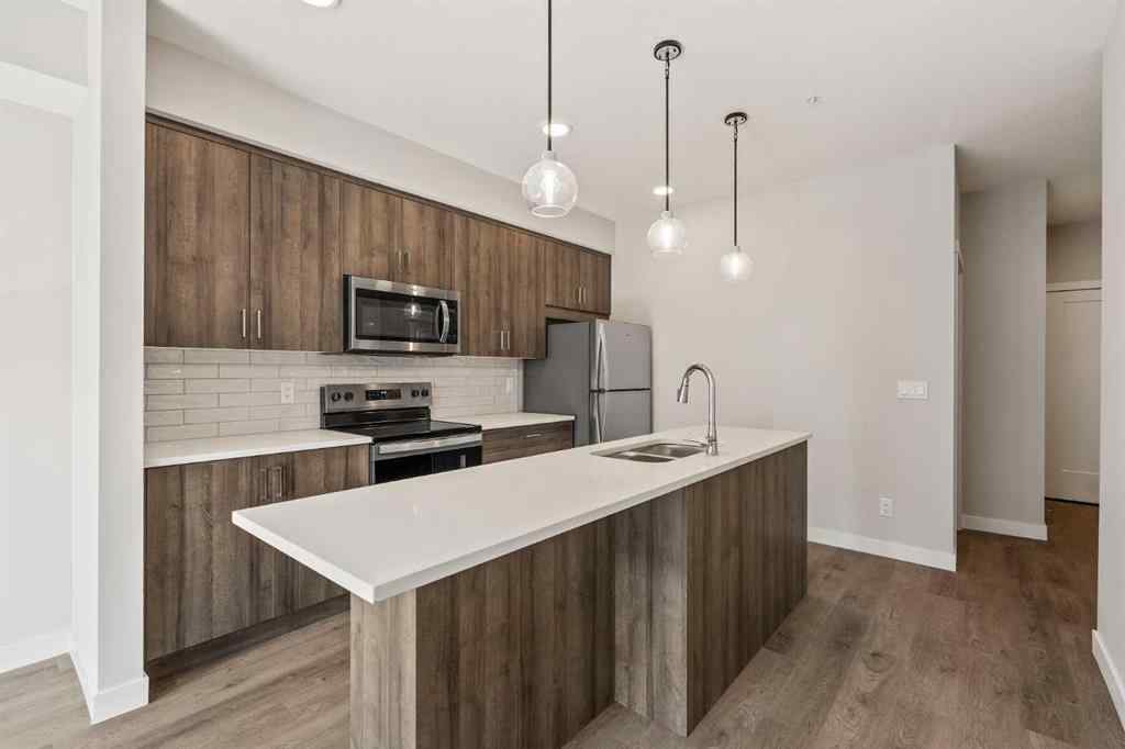 MLS® A2264270 - Unit #213 660 Shawnee Square SW in Shawnee Slopes Calgary, Residential