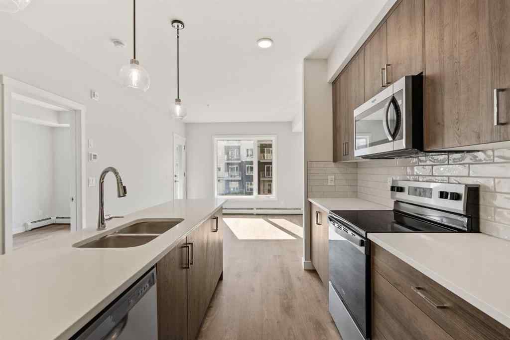 MLS® A2264270 - Unit #213 660 Shawnee Square SW in Shawnee Slopes Calgary, Residential