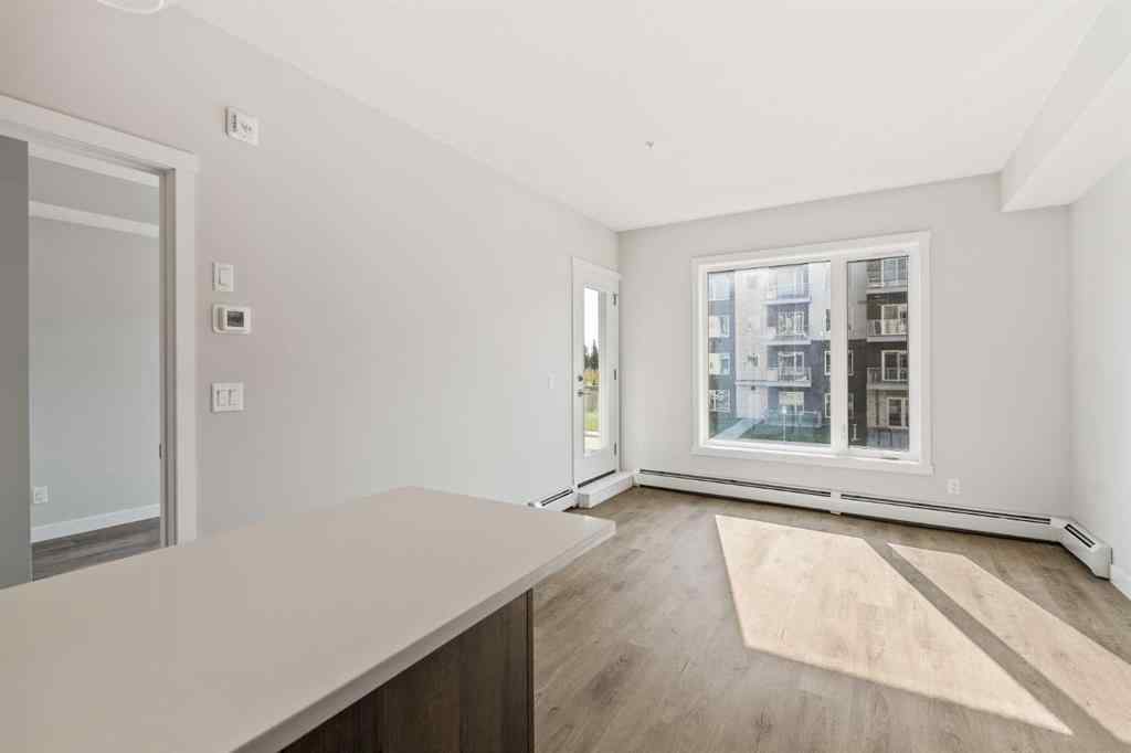MLS® A2264270 - Unit #213 660 Shawnee Square SW in Shawnee Slopes Calgary, Residential