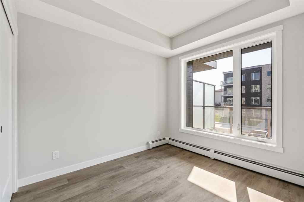 MLS® A2264270 - Unit #213 660 Shawnee Square SW in Shawnee Slopes Calgary, Residential