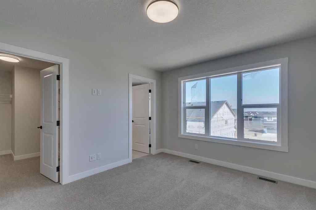 MLS® A2264277 - 92 Amblefield Grove NW in Moraine Calgary, Residential